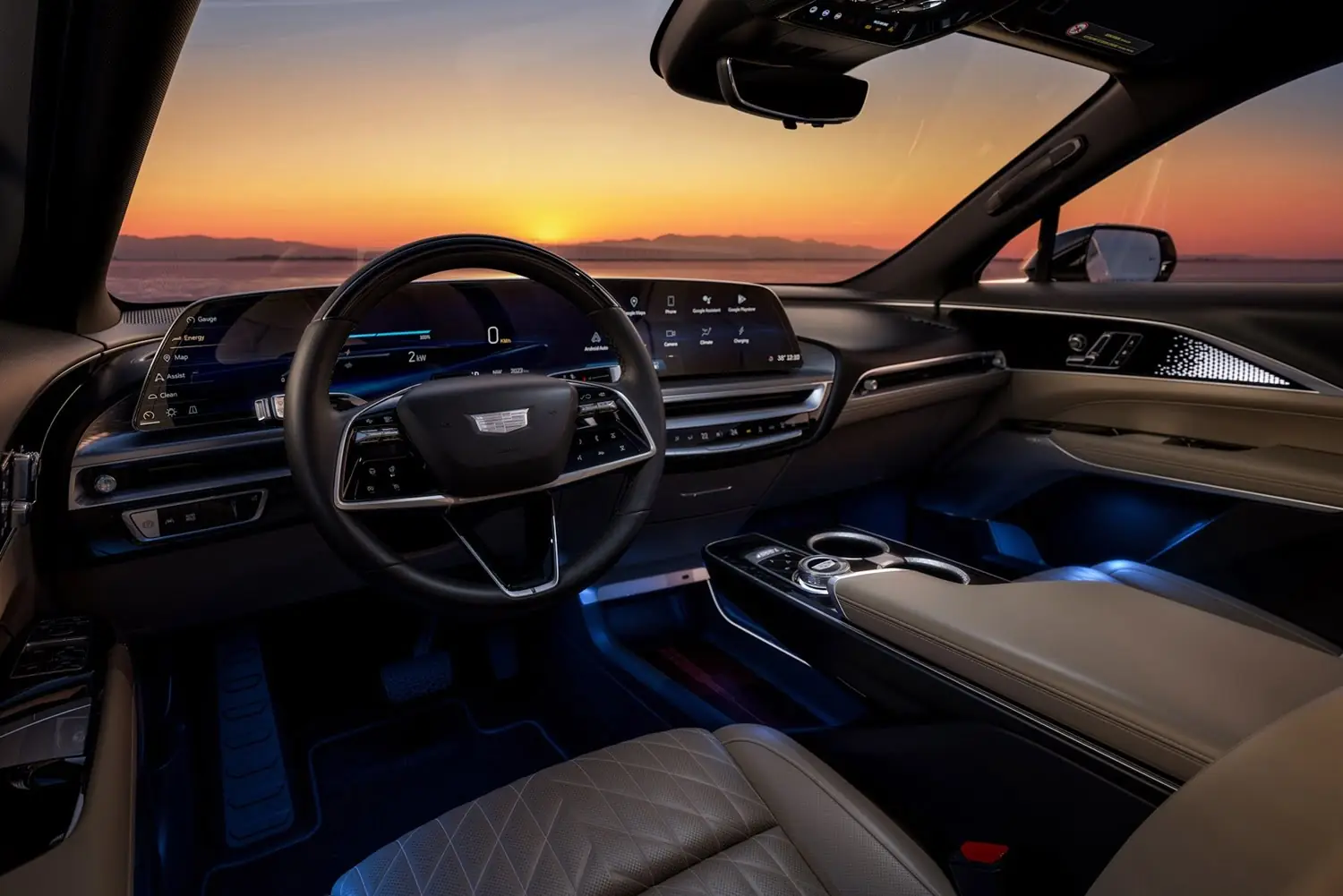 Interior of a 2024 Cadillac LYRIQ Sport with a wide digital display and ambient lighting